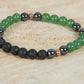 Avventurina, ematite, lava, rame, charms
